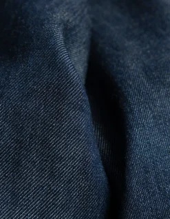 Jean large bleu taille haute ceinturé Femme