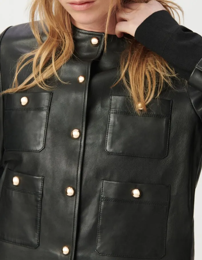 Veste courte noire en cuir quatre poches plaquées Femme