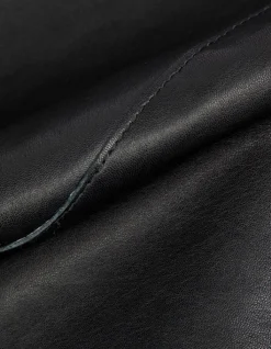 Veste cuir noir bavolet et poche biais Femme